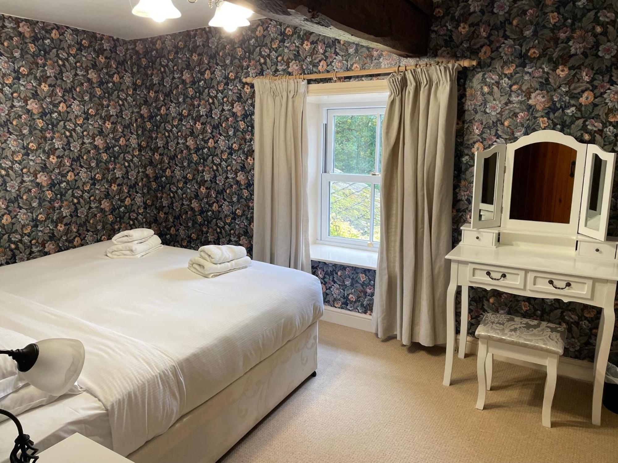 Ashfield House Hotel Grassington Quarto foto The bedroom at The Old Post Office