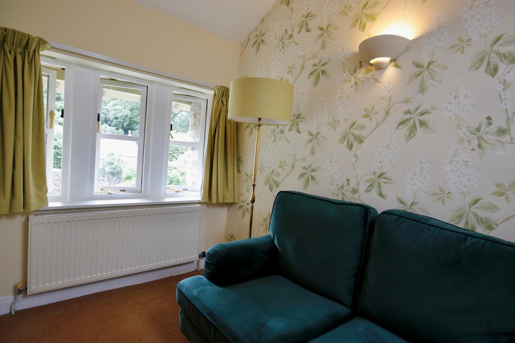 Ashfield House Hotel Grassington Quarto foto A radiator in a living room