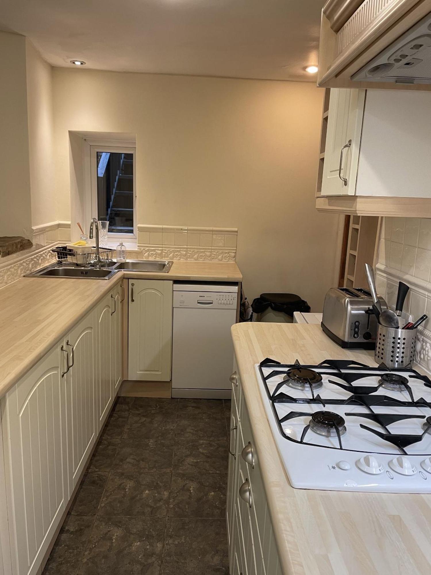 Ashfield House Hotel Grassington Quarto foto A typical kitchen in the UK